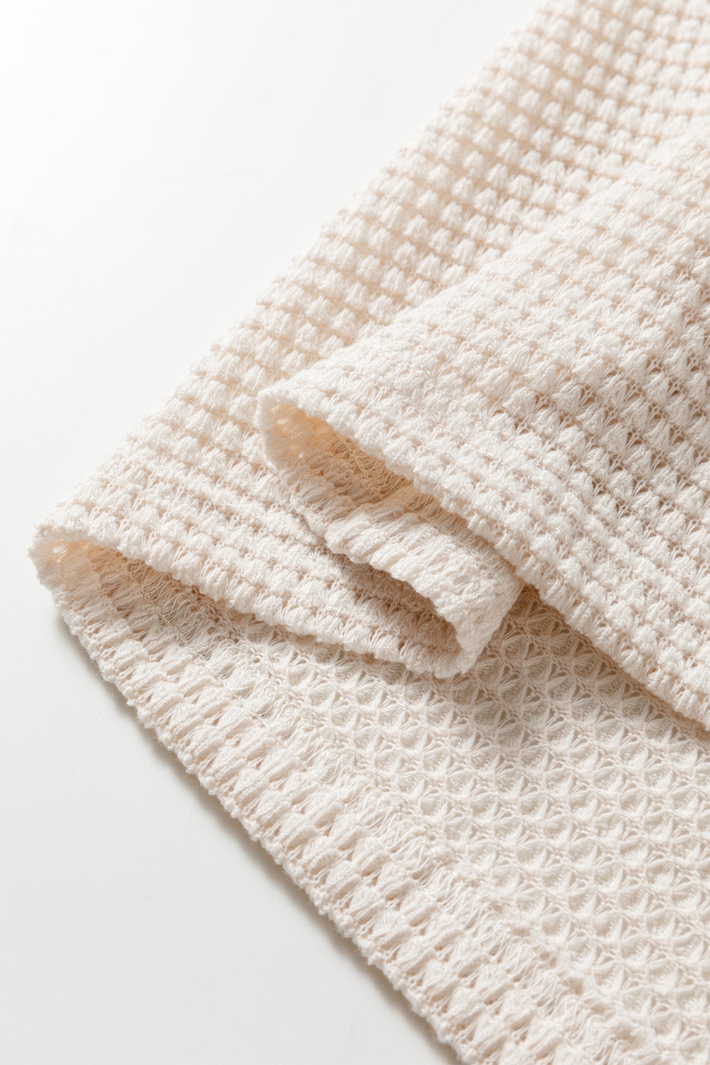 Jet Stream Textured Knit Asymmetric Top